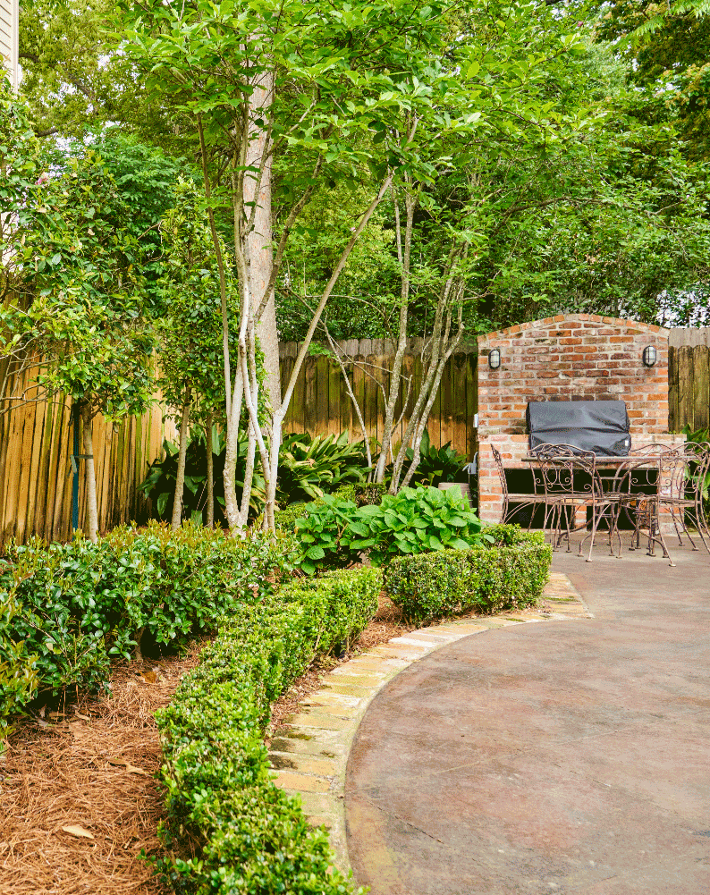 Landscaped patio and garden maintained by Sawtooth Design LLC in Metairie, LA